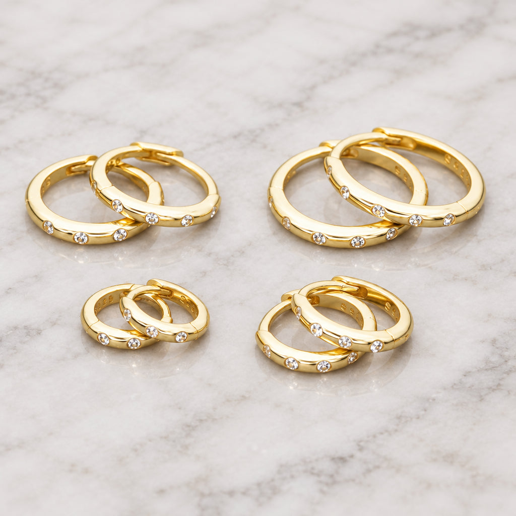 Gold CZ stacking hoop earrings in four sizes