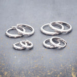 indie and harper sterling silver hoop earrings with dainty cubic zirconias in four different size hoops