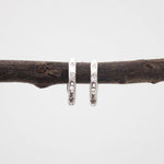 indie and harper silver Hoop earrings with cubic zirconias