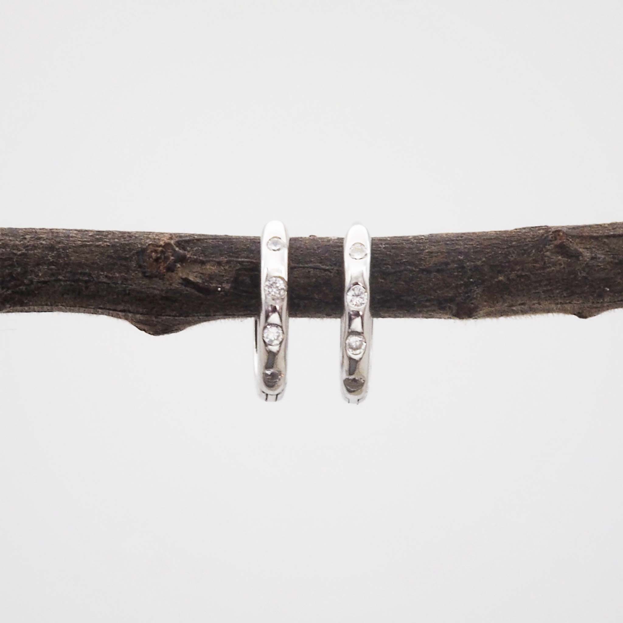 indie and harper silver Hoop earrings with cubic zirconias