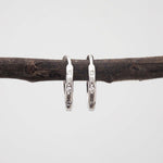 indie and harper silver Hoop earrings with cubic zirconias