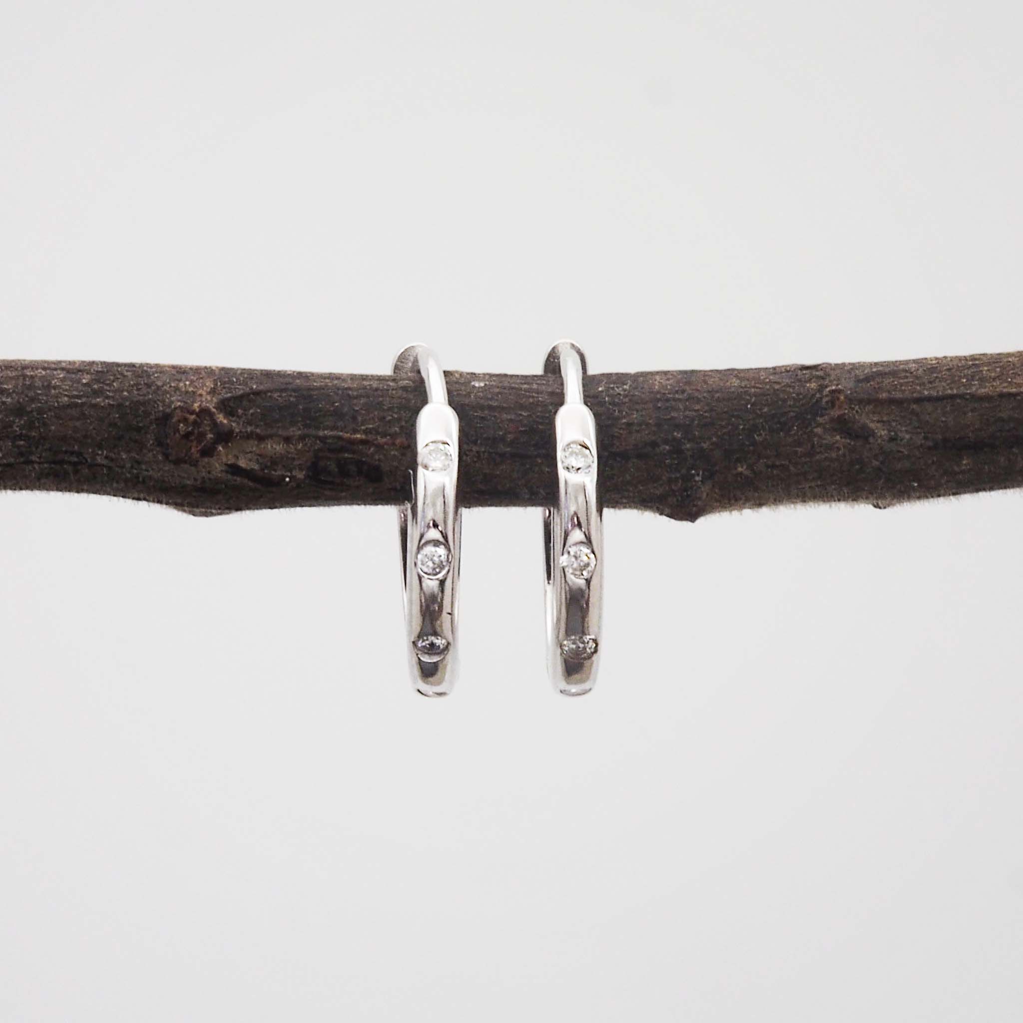 indie and harper silver Hoop earrings with cubic zirconias