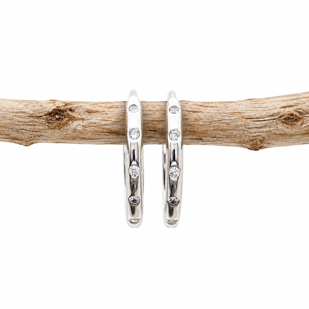 Silver CZ stacking hoop earring from another angle
