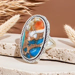 sterling silver spiny oyster turquoise ring on a stone by indie and harper australia