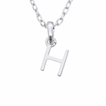 Indie and Harper Sterling Silver necklace with a 'H' initial pendant on a white background