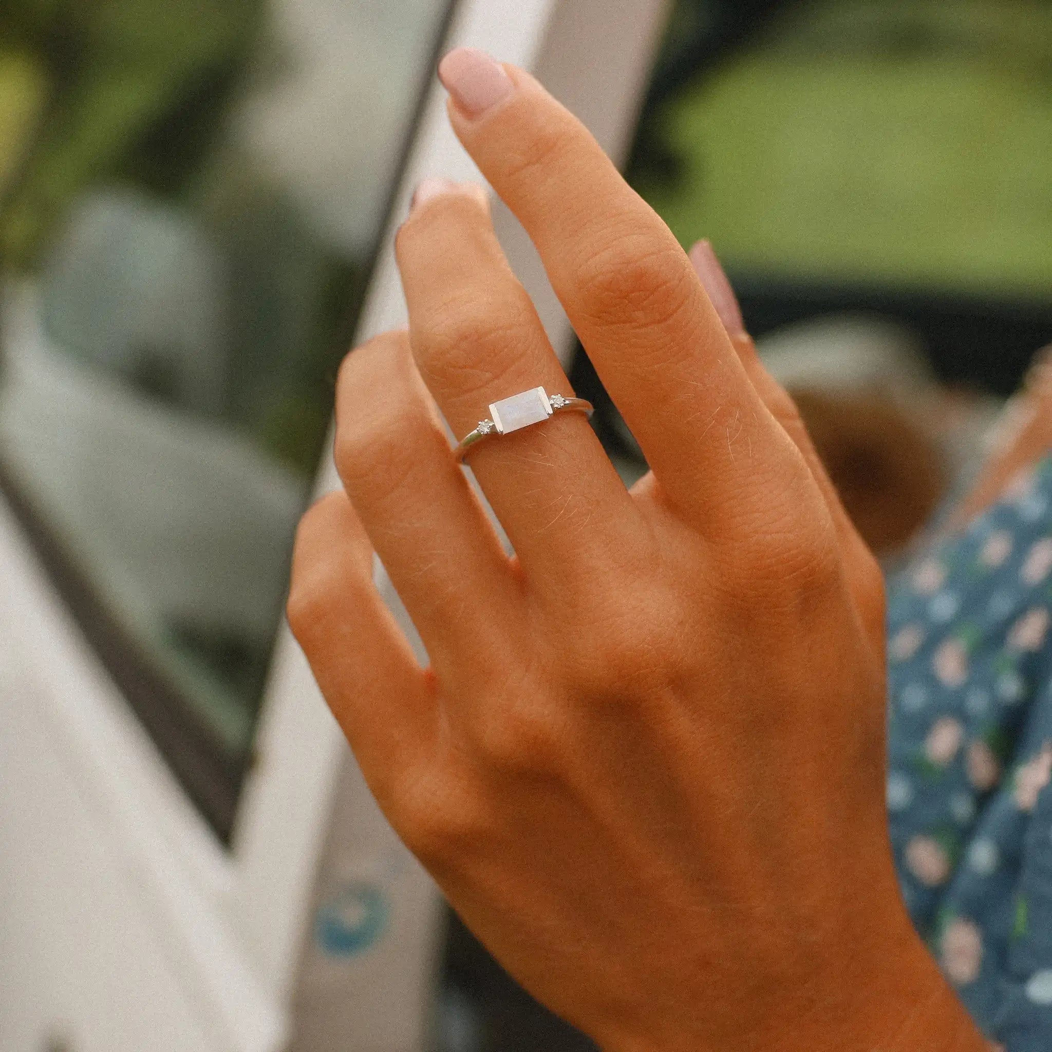 indie and harper sterling silver white topaz and moonstone ring being worn