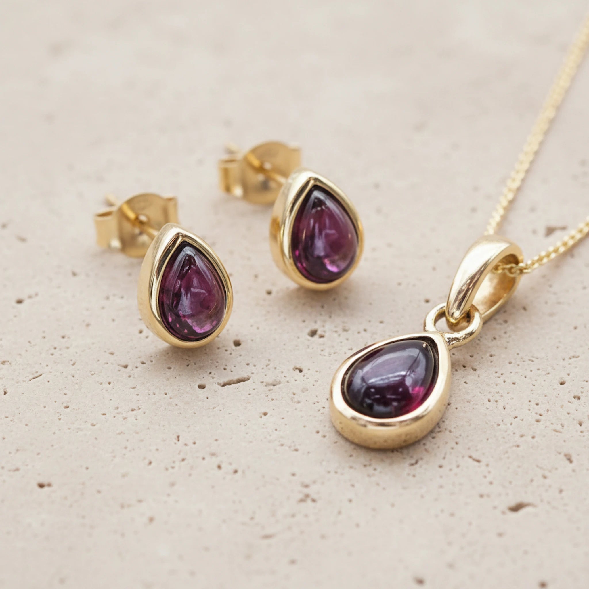 Gold January Birthstone Garnet Jewellery Set including pear-shaped natural Garnet stud earrings and pendant necklace