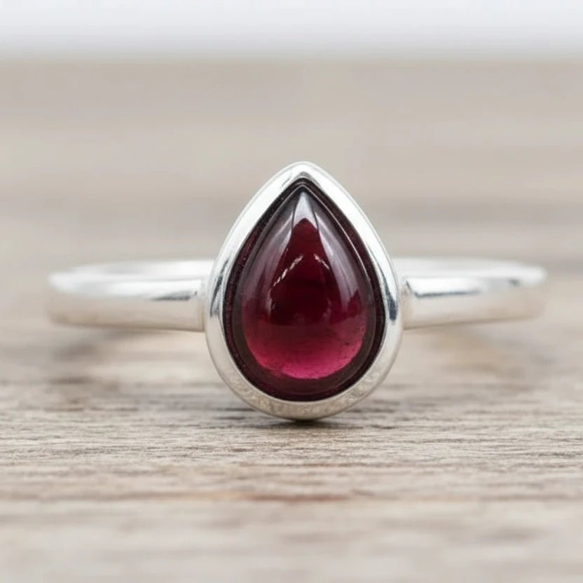 Sterling Silver January birthstone ring with pear-shaped natural garnet gemstone as a meaningful birthstone jewellery gift for her