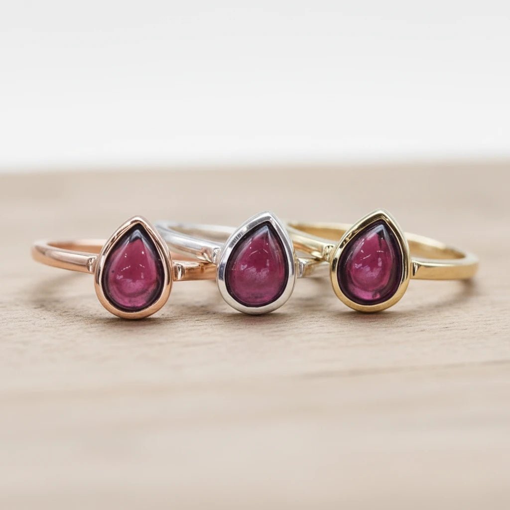 January birthstone rings in sterling silver, gold and rose gold featuring natural garnet gemstones as a meaningful gift