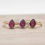 January birthstone rings in sterling silver, gold and rose gold featuring natural garnet gemstones as a meaningful gift