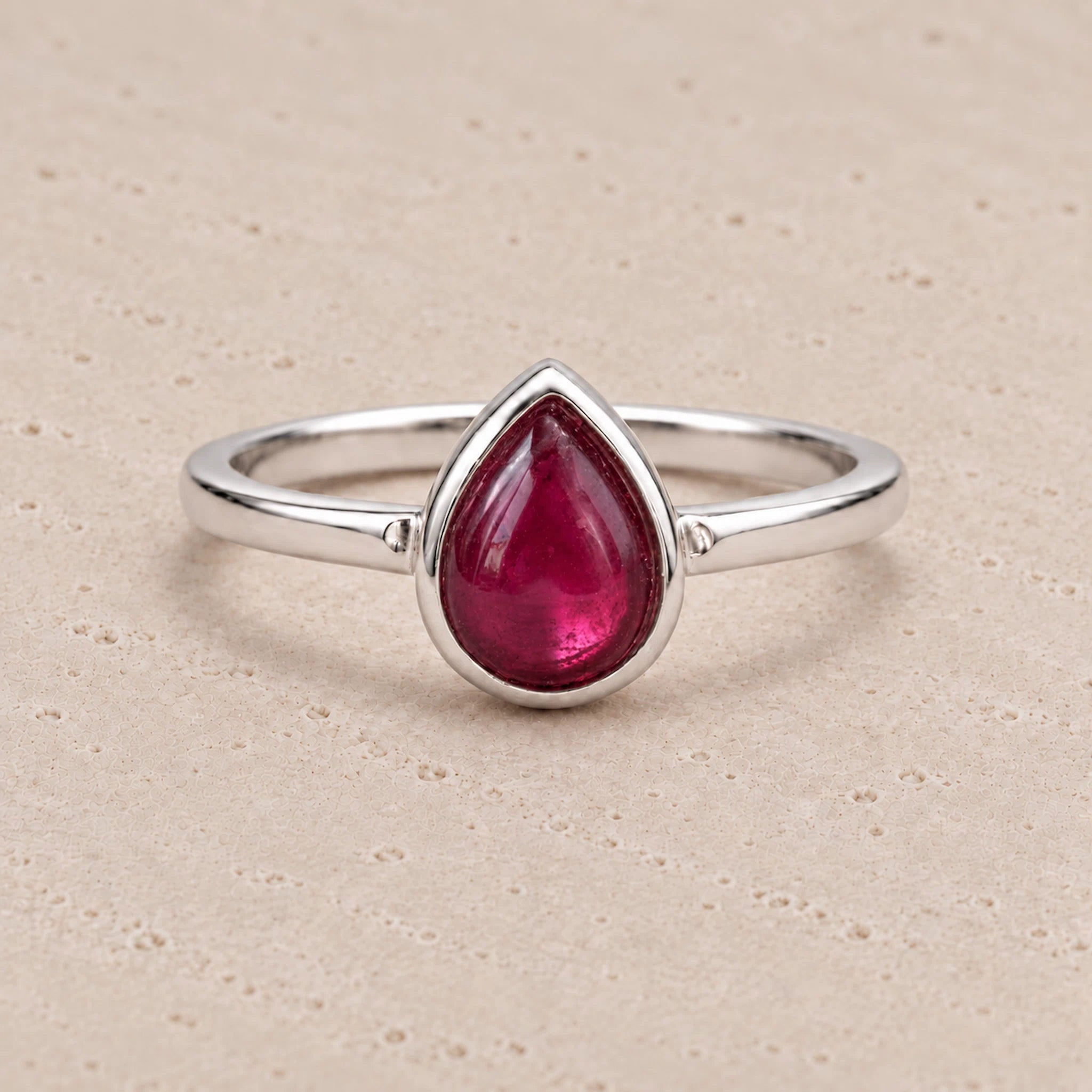 Sterling Silver July birthstone Ring with pear-shaped natural ruby gemstone as a meaningful birthday jewellery gift for her.