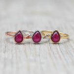 July birthstone Rings with pear-shaped natural ruby gemstones as meaningful birthday jewellery gifts for her.