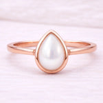 Rose Gold June Birthstone Ring with pear-shaped pearl as a meaningful June birthstone jewellery gift for her