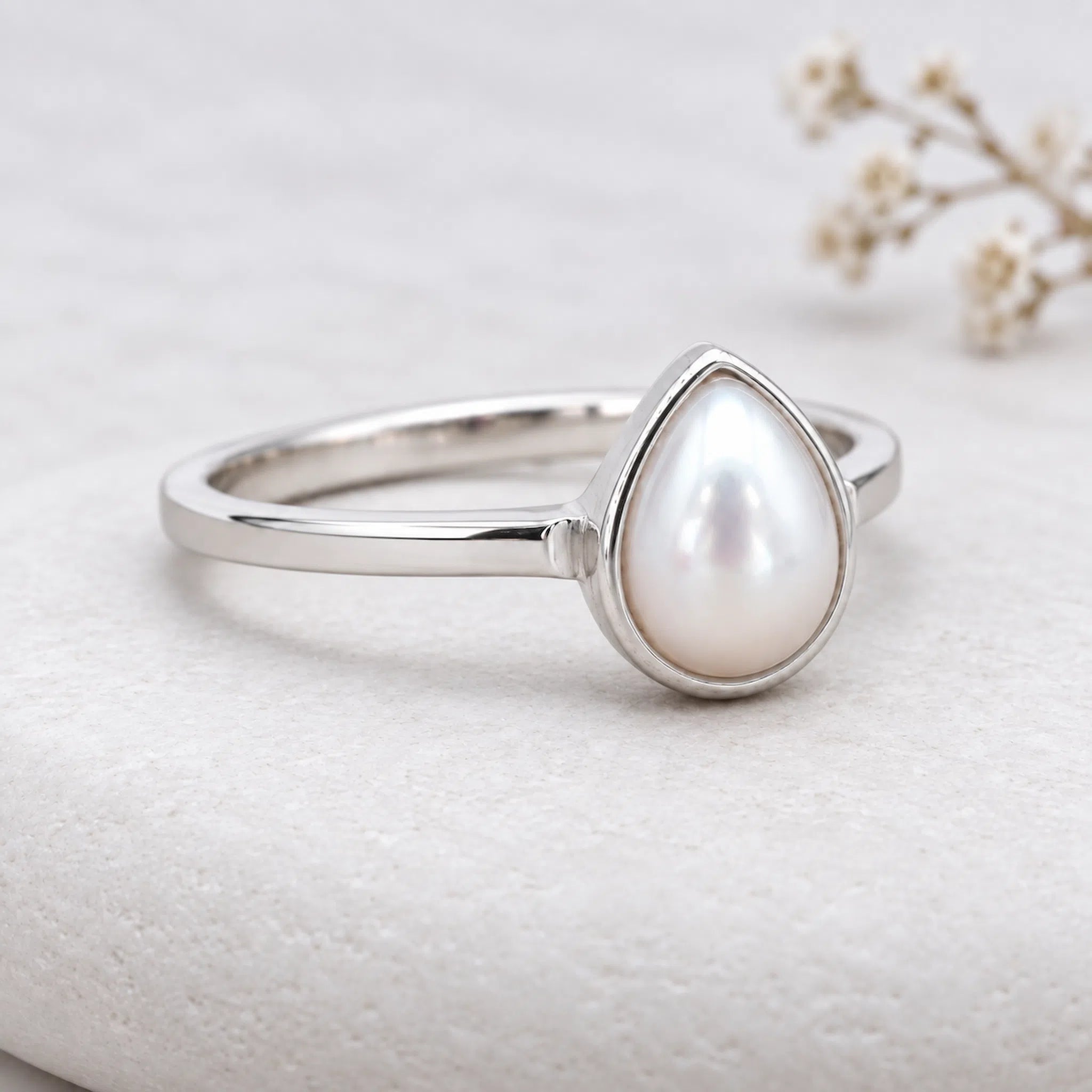 silver june birthstone ring - Dainty sterling silver ring featuring a pear-shaped natural mother of pearl stone set in a smooth bezel.