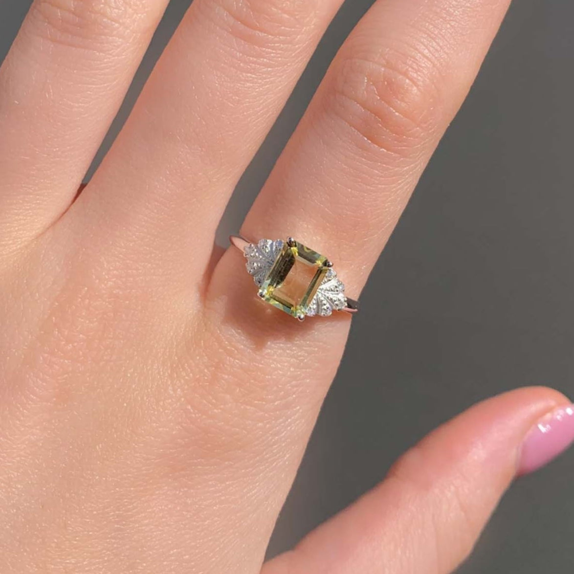White topaz and lemon quartz ring being worn - indie and Harper 