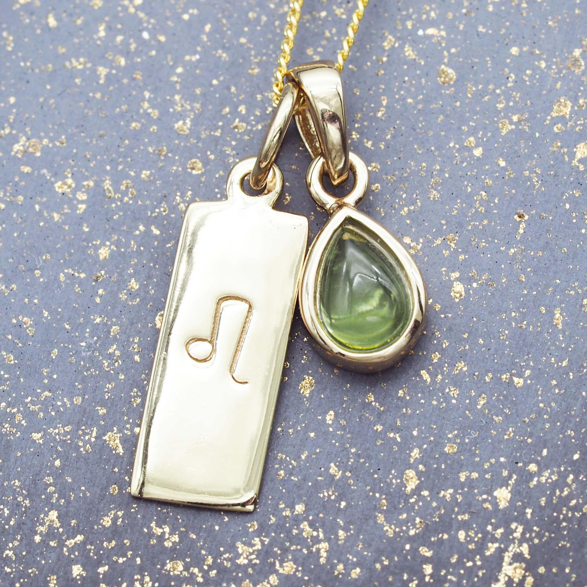 gold Leo and August birthstone peridot necklace by indie and harper australia 
