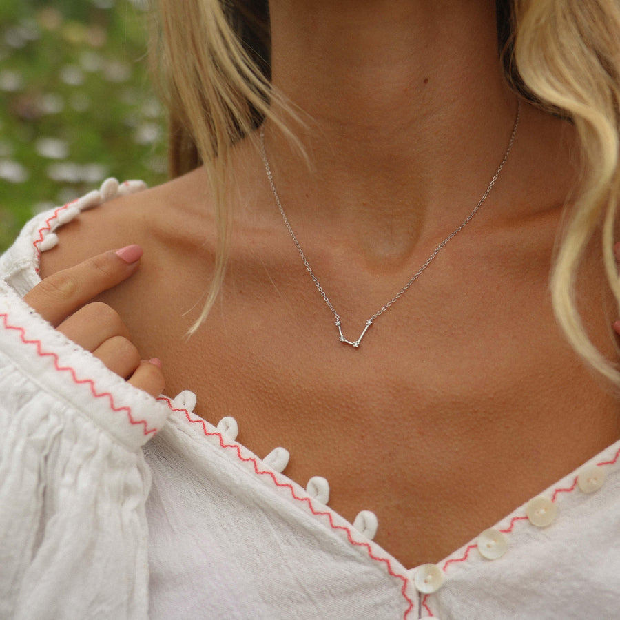 Woman wearing silver Constellation Necklace - womens zodiac jewellery Australia