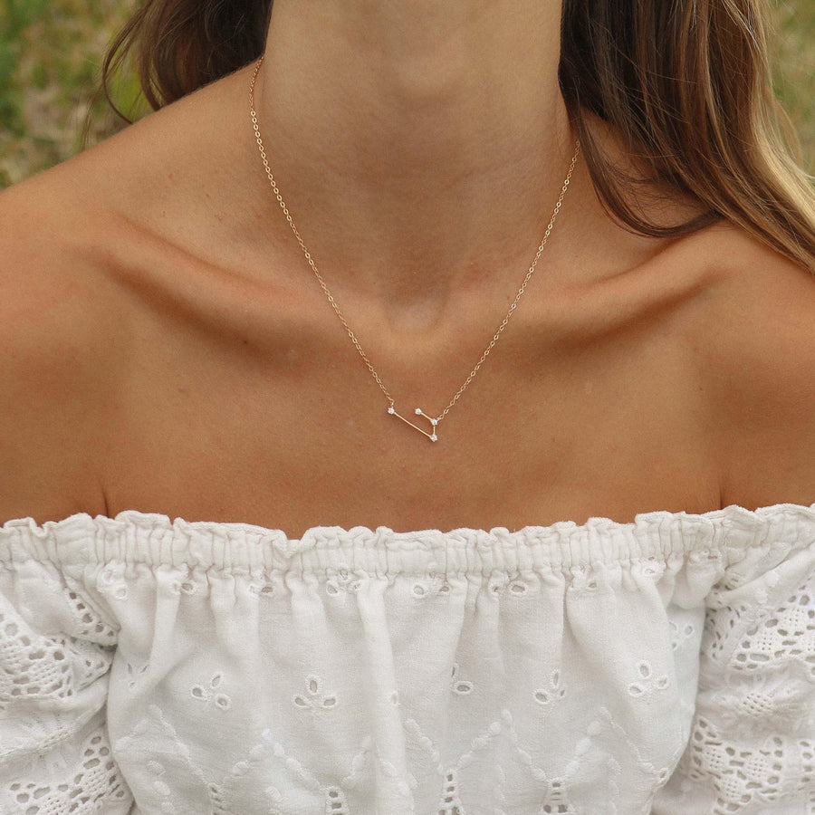 Woman wearing rose gold necklace with Constellation design - womens zodiac jewellery Australia