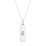 A silver leo necklace with zodiac rectangular pendant necklace with a black astrological symbol engraved on it, suspended from a delicate silver chain against a plain white background.