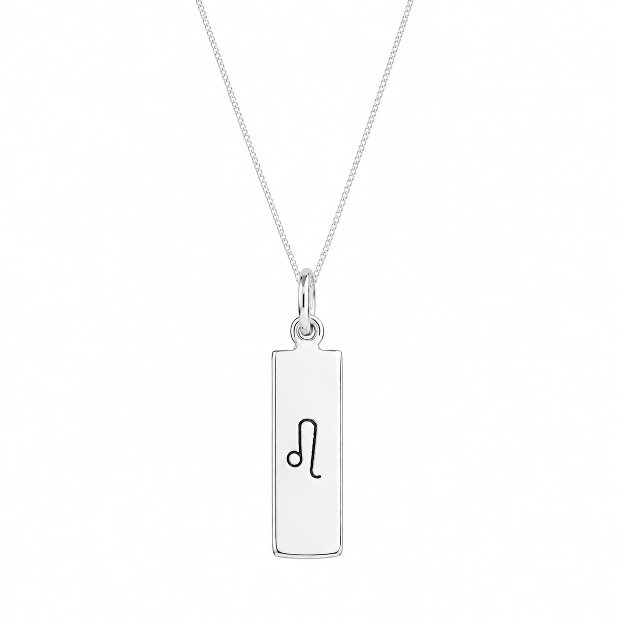 A silver leo zodiac rectangular pendant necklace with a black astrological symbol engraved on it, suspended from a delicate silver chain against a plain white background.