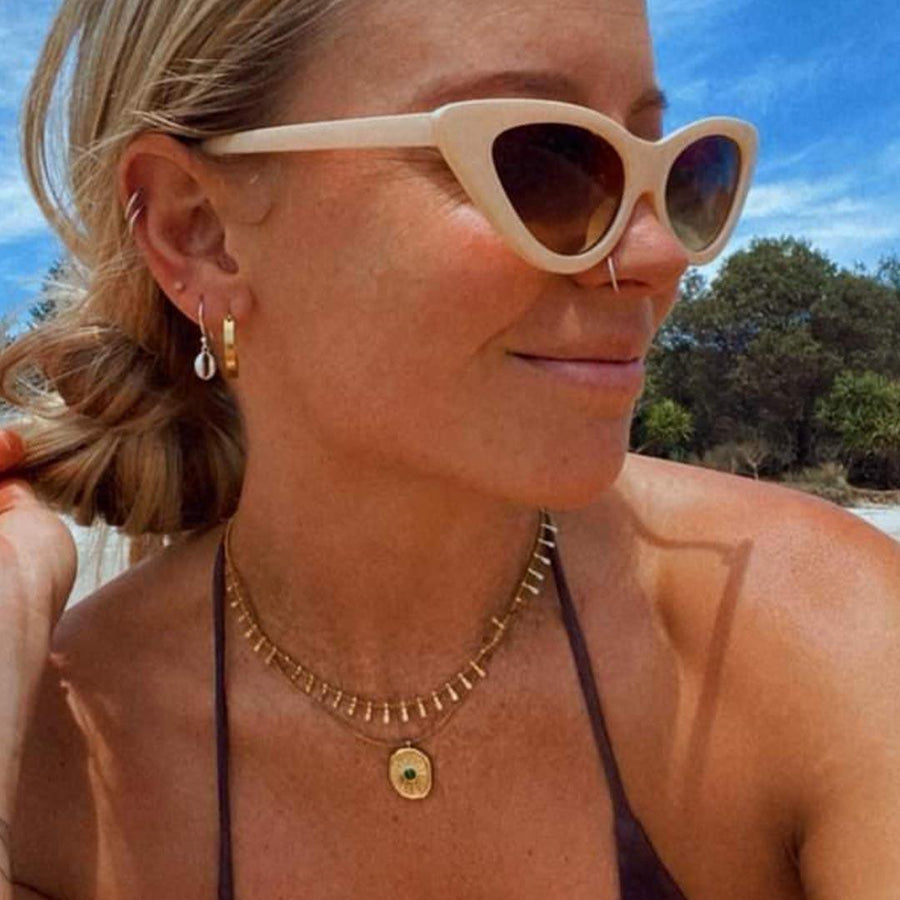 Woman wearing gold Necklaces - gold waterproof jewellery Australia