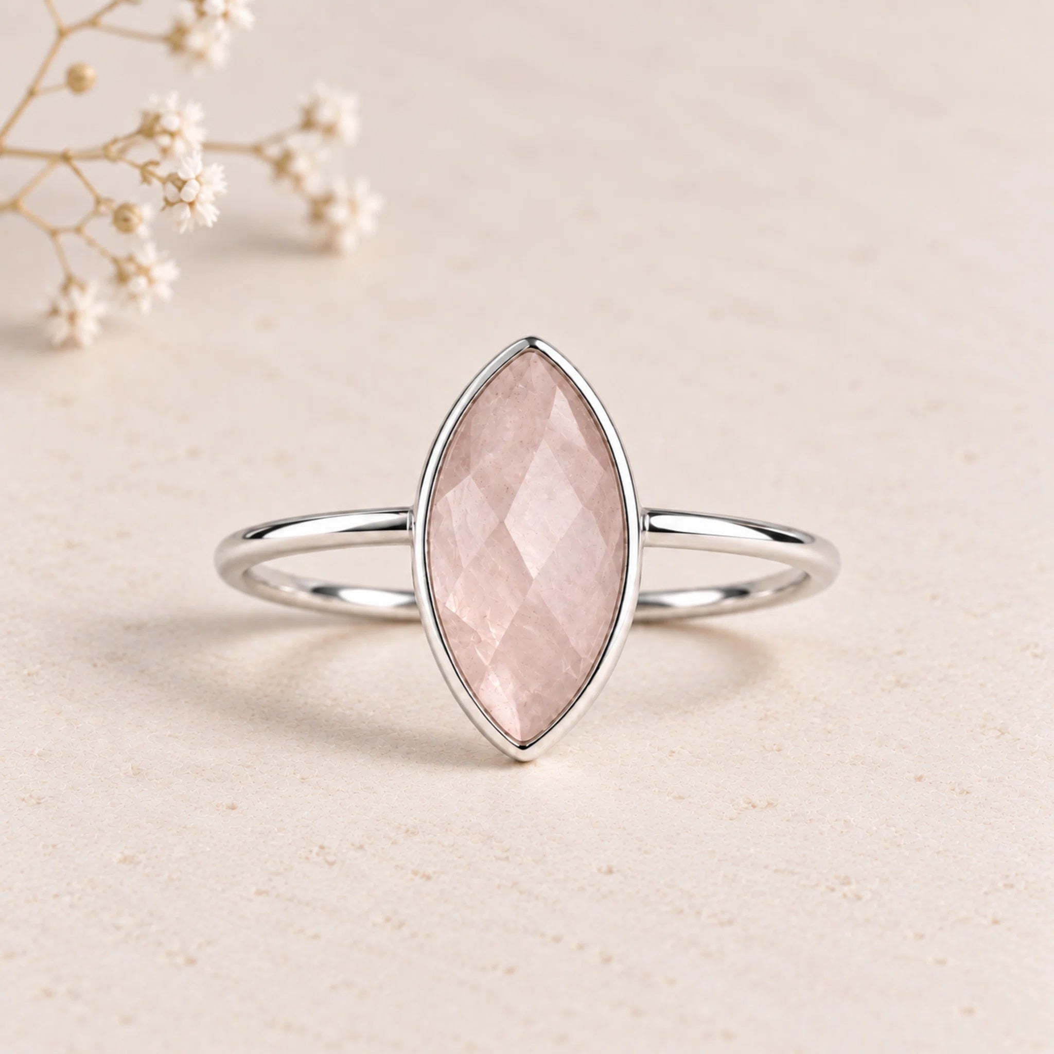 sterling silver rose cut, bezel set, marquise shaped natural rose quartz ring