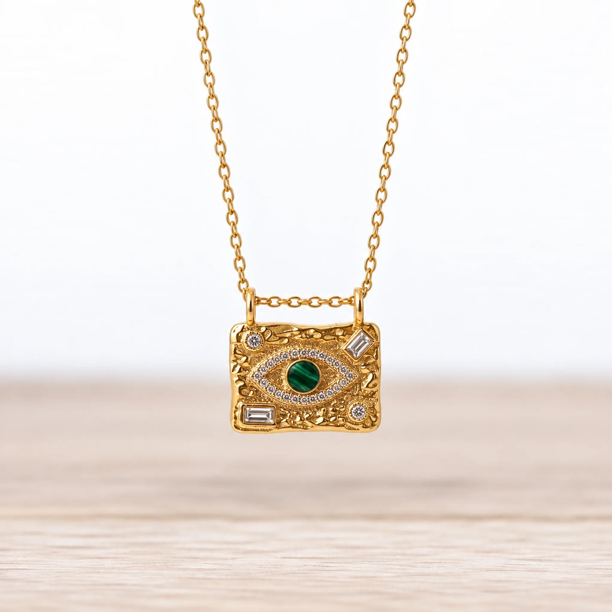 Malachite Evil Eye Waterproof Gold Necklace in stainless steel hanging