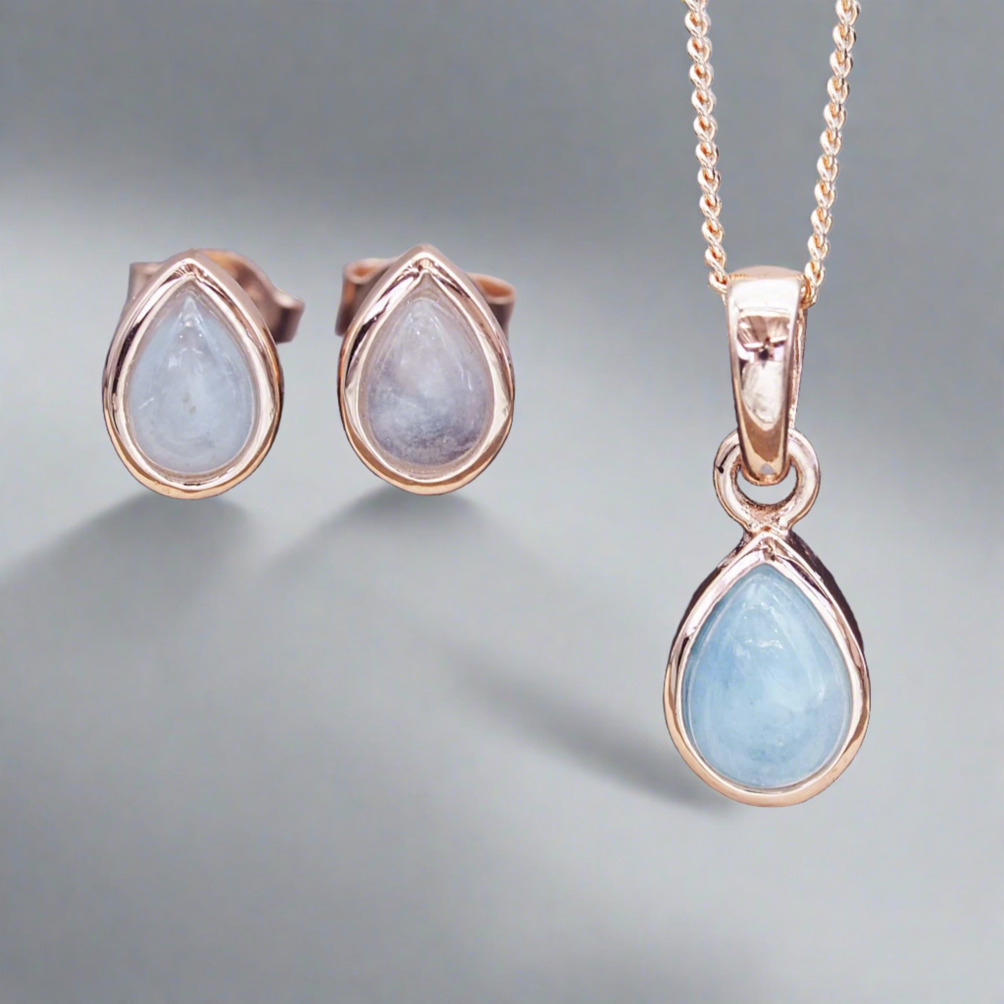 Rose Gold March Birthstone Aquamarine jewellery set including aquamarine earrings and aquamarine necklace by indie and harper