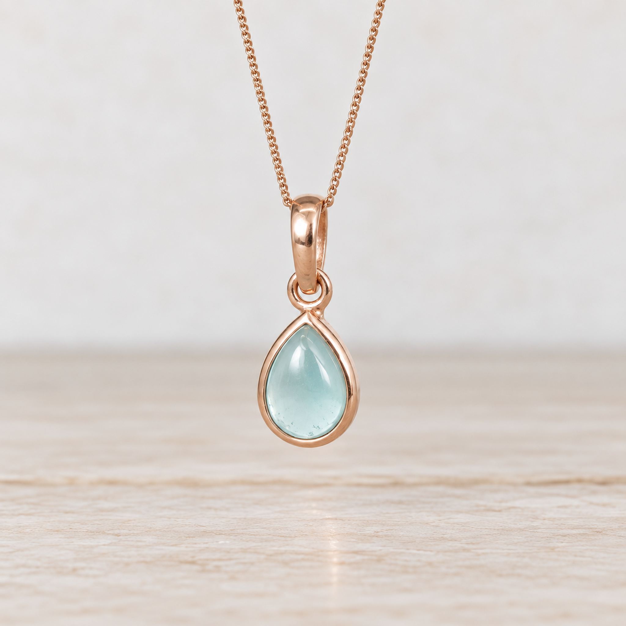 Rose Gold March birthstone necklace with a pear-shaped natural aquamarine gemstone pendant - meaningful gift for her