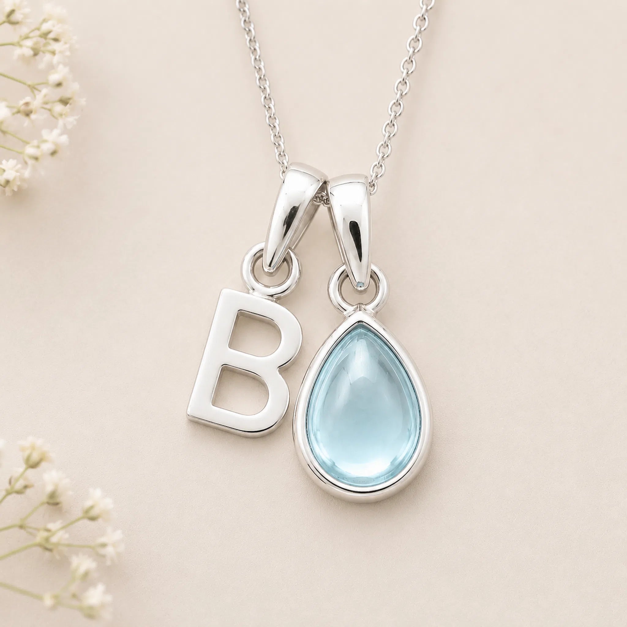 Sterling Silver March birthstone Necklace with a pear-shaped natural Aquamarine gemstone pendant and letter 'B' charm