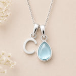Sterling Silver March birthstone Necklace with a pear-shaped natural Aquamarine gemstone pendant and letter 'C' charm