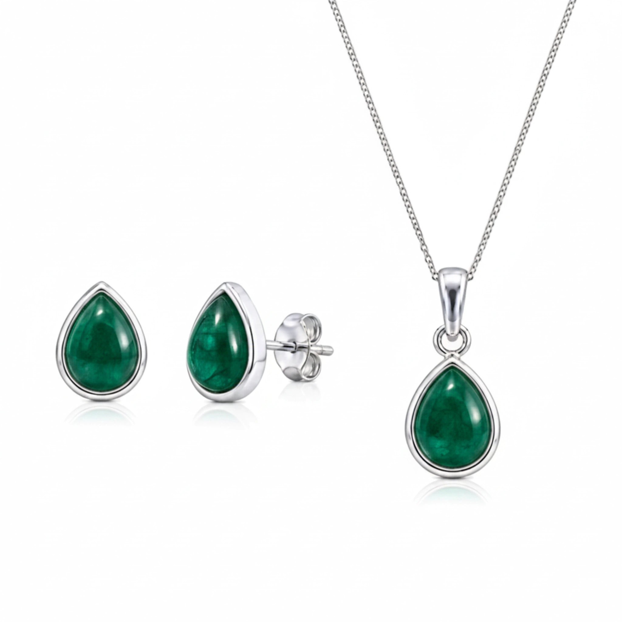 Sterling Silver May Birthstone Jewellery set featuring a pair of teardrop stud natural emerald earrings and matching natural emerald pendant necklace on a white background