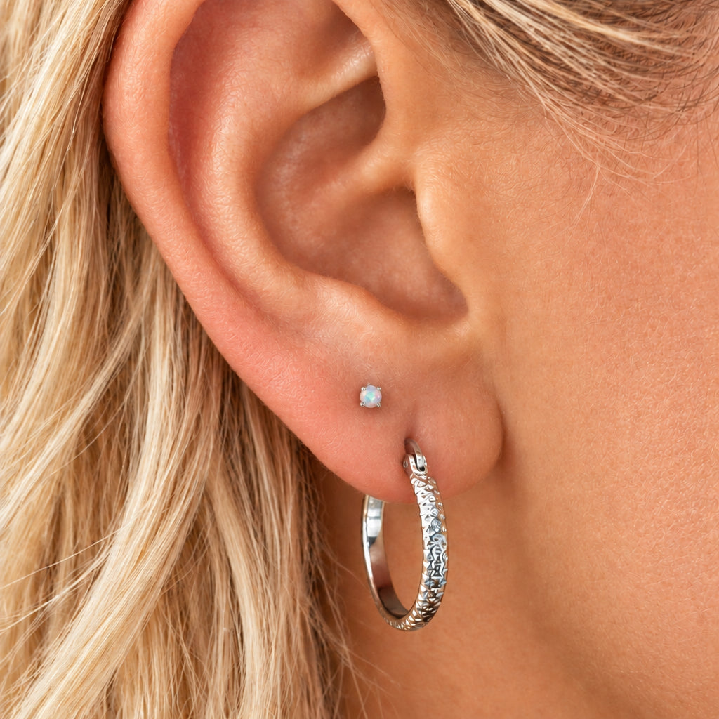 Micro opal ball back stud, close-up