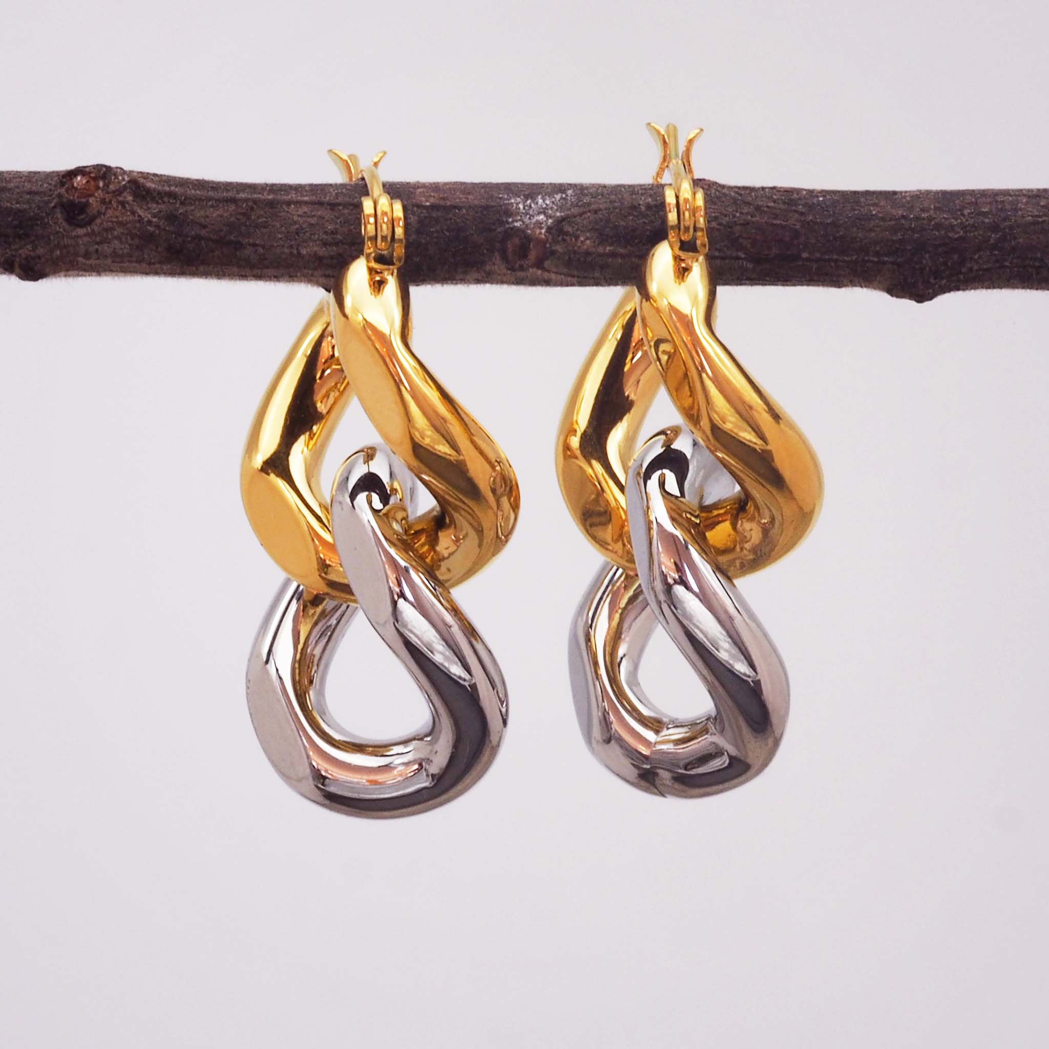 mixed metal statement earrings with link design - made with gold plating over stainless steel by online jewellery brand indie and harper