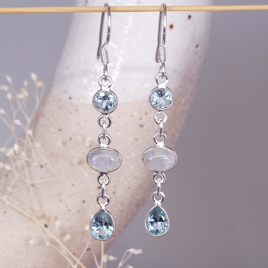 moonstone and blue topaz earrings - sterling silver earrings with a classic french hook design - made with natural blue topaz and rainbow moonstone earrings 
