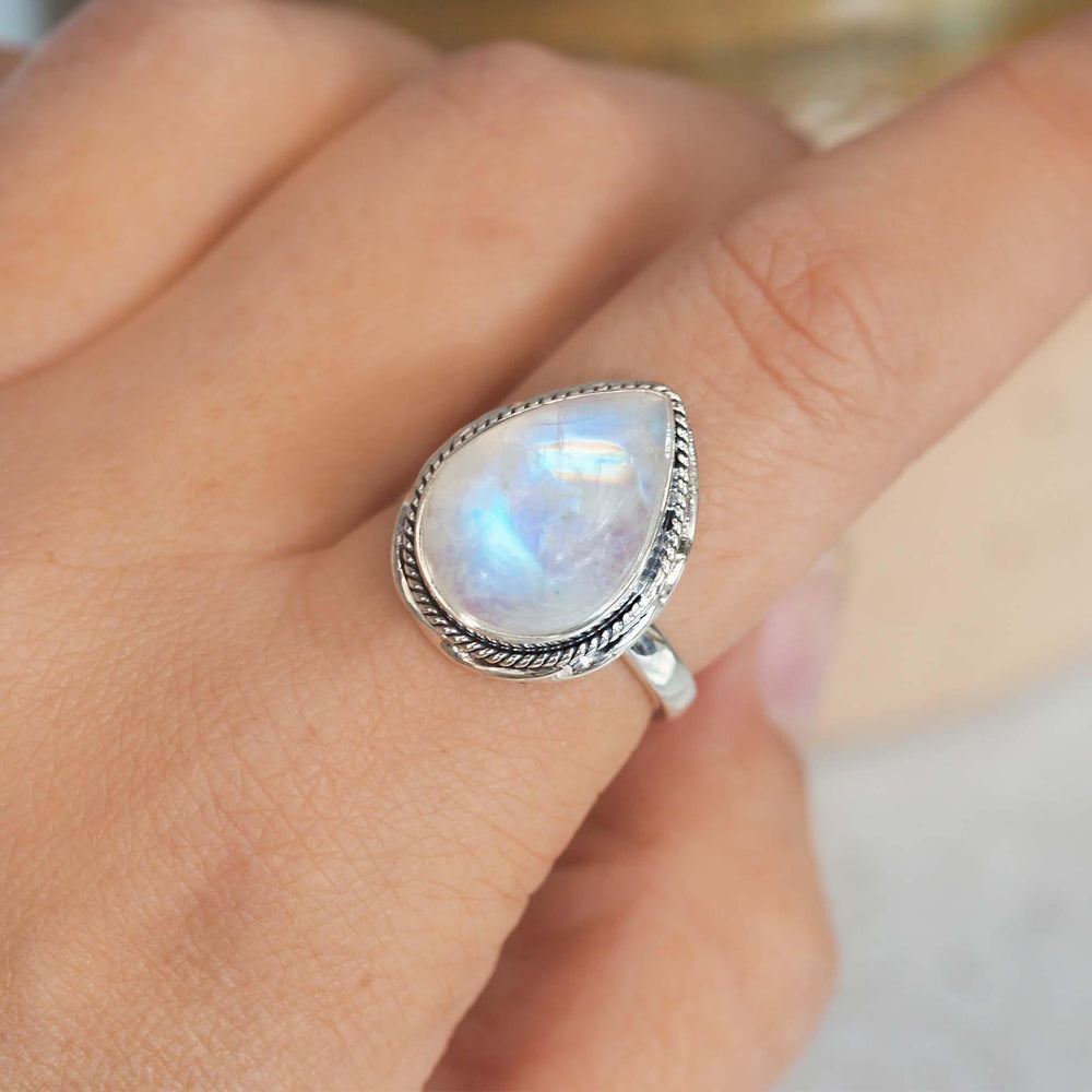 sterling silver large pear shaped cabochon bezel set natural Moonstone Ring being worn