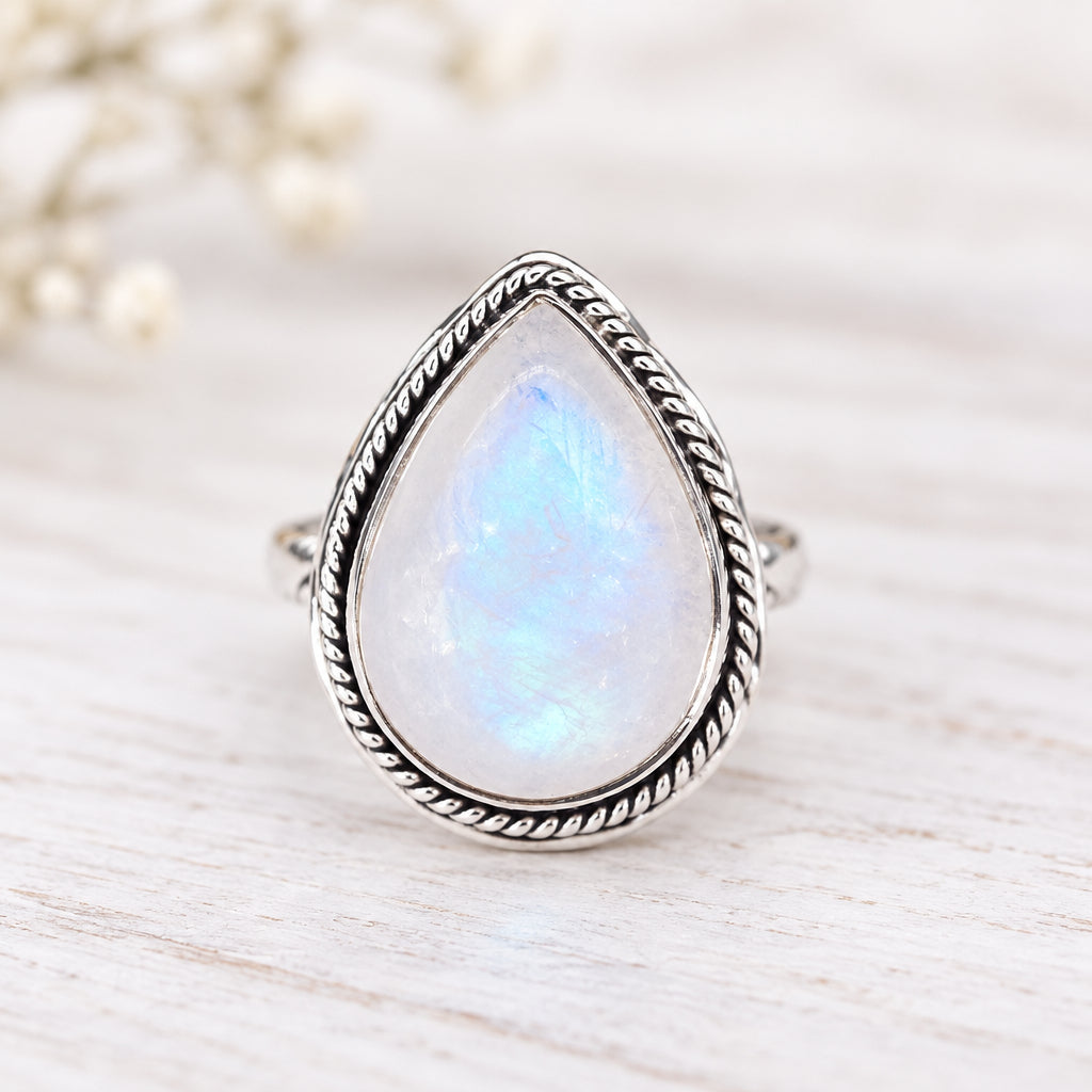 Sterling silver teardrop moonstone ring with a double twist band
