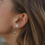 Woman wearing silver Moonstone Earrings by indie and harper