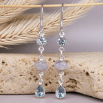 Sterling Silver earrings with Blue Topaz and Moonstone gemstones on a natural background by indie and harper australia