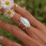 Sterling silver moonstone statement ring worn on a finger