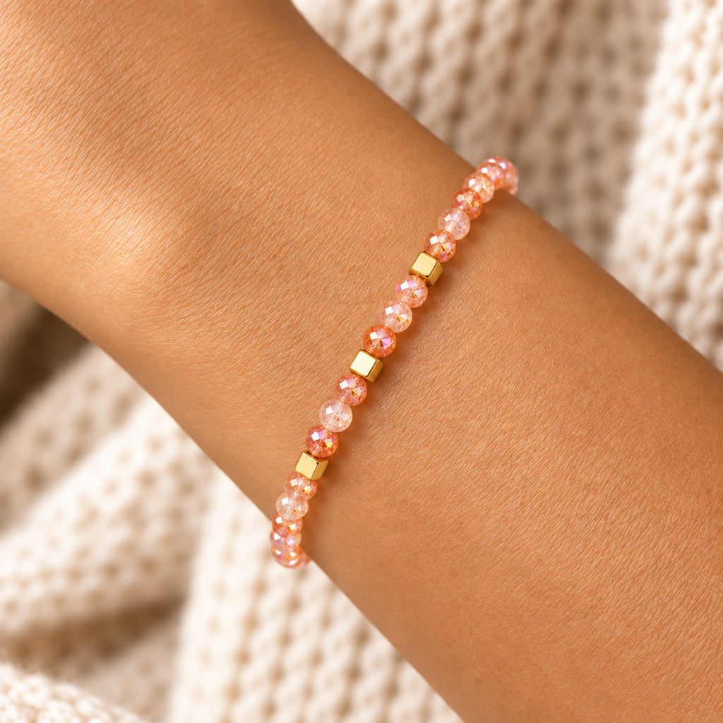 Natural Sunstone Gold Beaded Bracelet worn on wrist close up