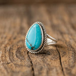 Genuine Sterling Silver Navajo Kingman Turquoise Ring - Pear-shaped ring with timber background