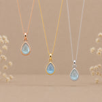 three november birthstone natural blue topaz pear-shaped pendant necklaces in rose gold, gold and silver
