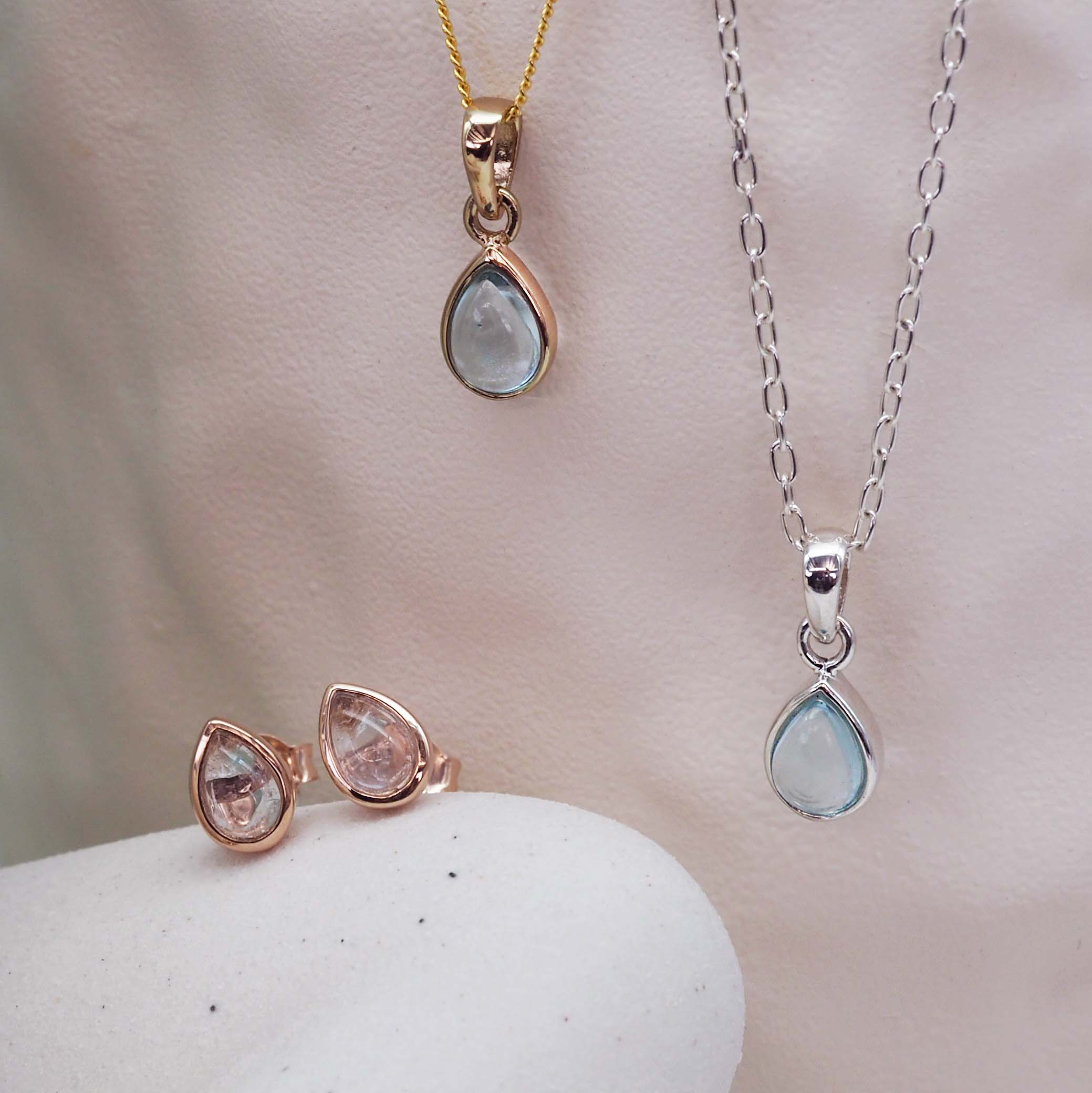 november birthstone jewellery group shot with natural blue topaz gemstones as meaningful birthstone gifts for her