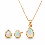 october birthstone jewellery set featuring Gold teardrop pendant necklace and matching stud earrings with iridescent opal gemstones, shown on a clean white background.