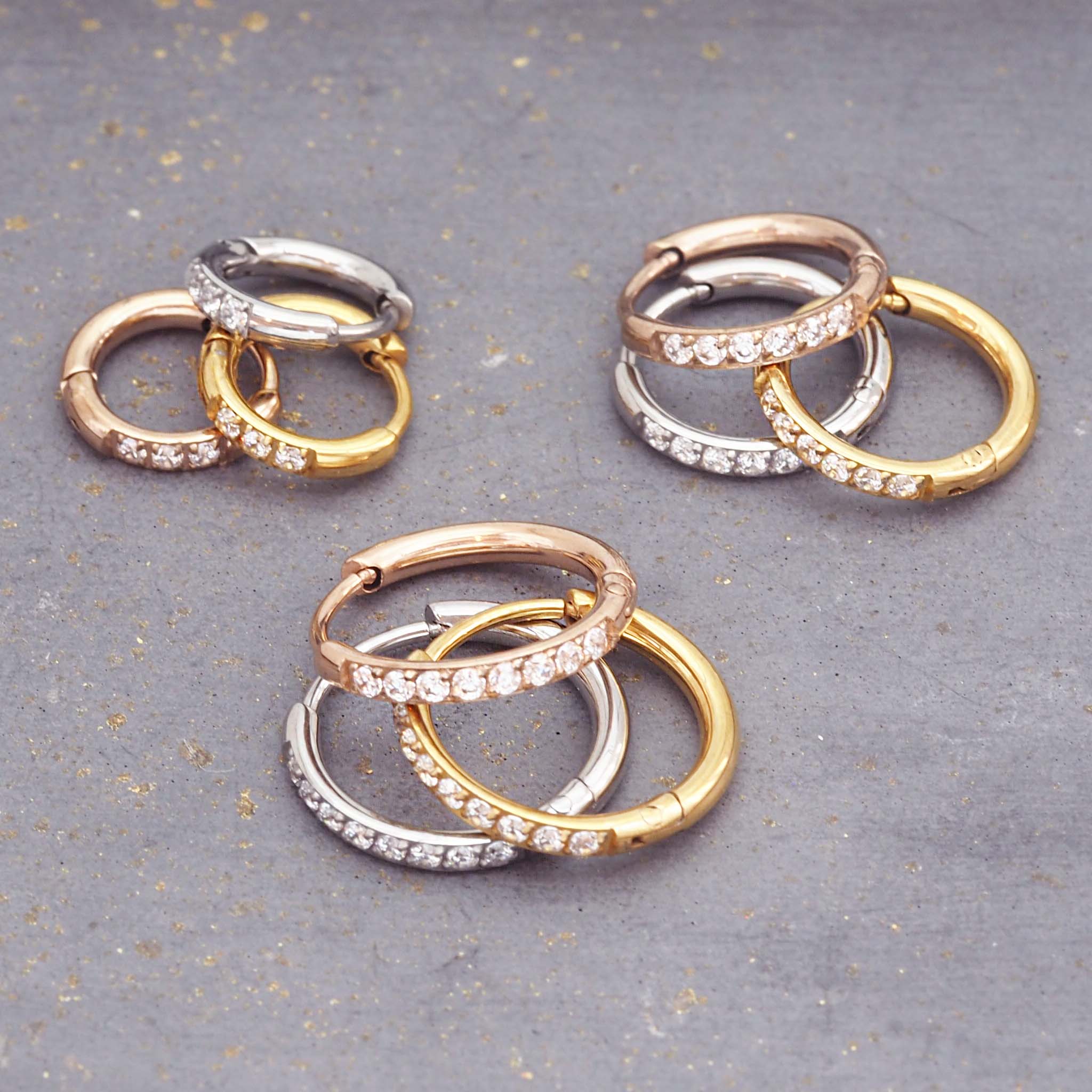 pavé stacking waterproof hoop earrings in silver, gold and rose gold plated stainless steel