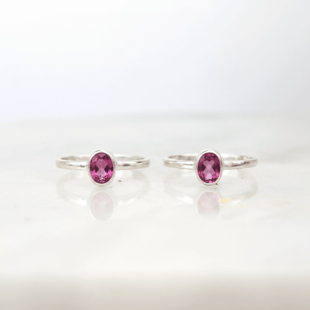 two sterling silver pink topaz rings