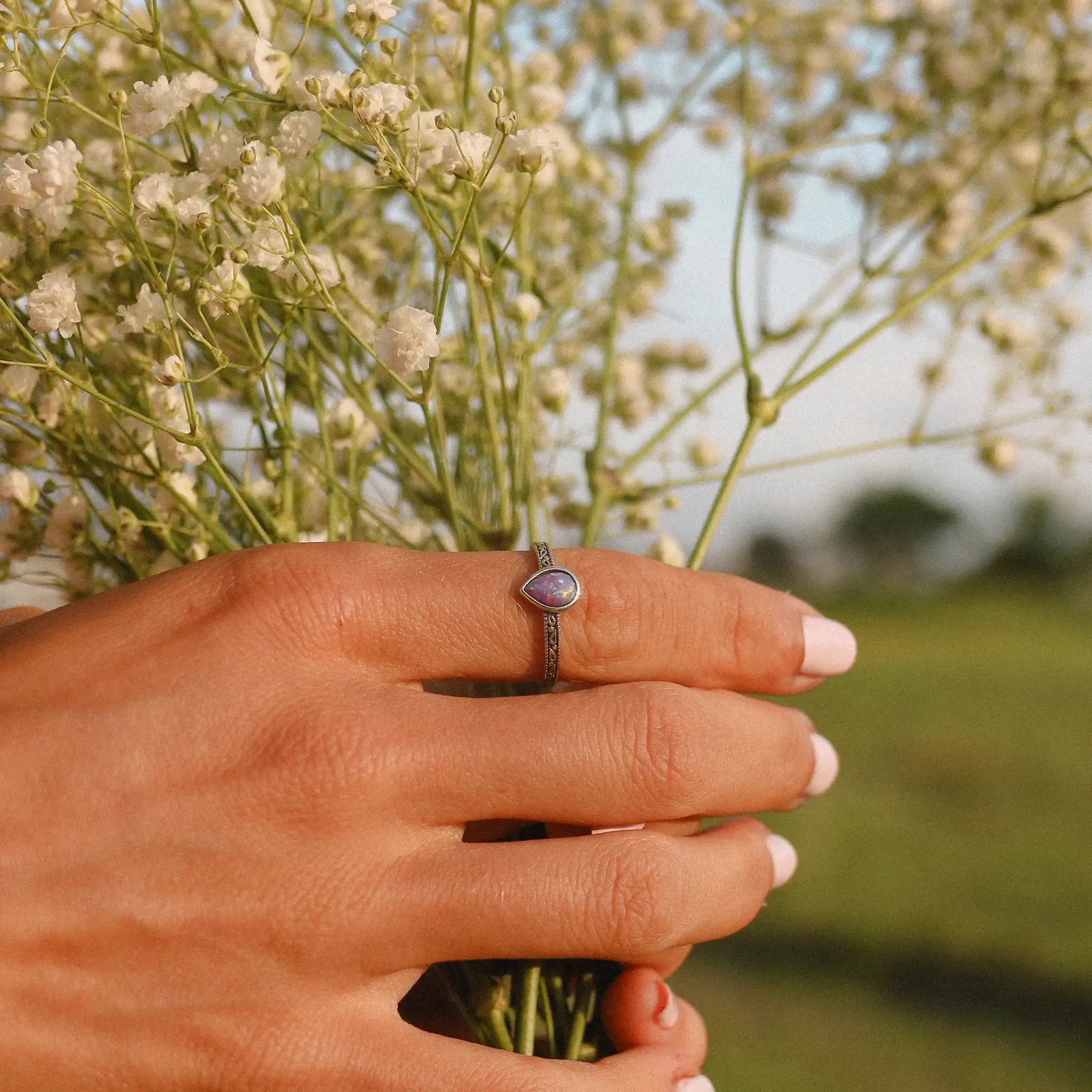 indie and harper sterling silver Purple Opal Ring being worn