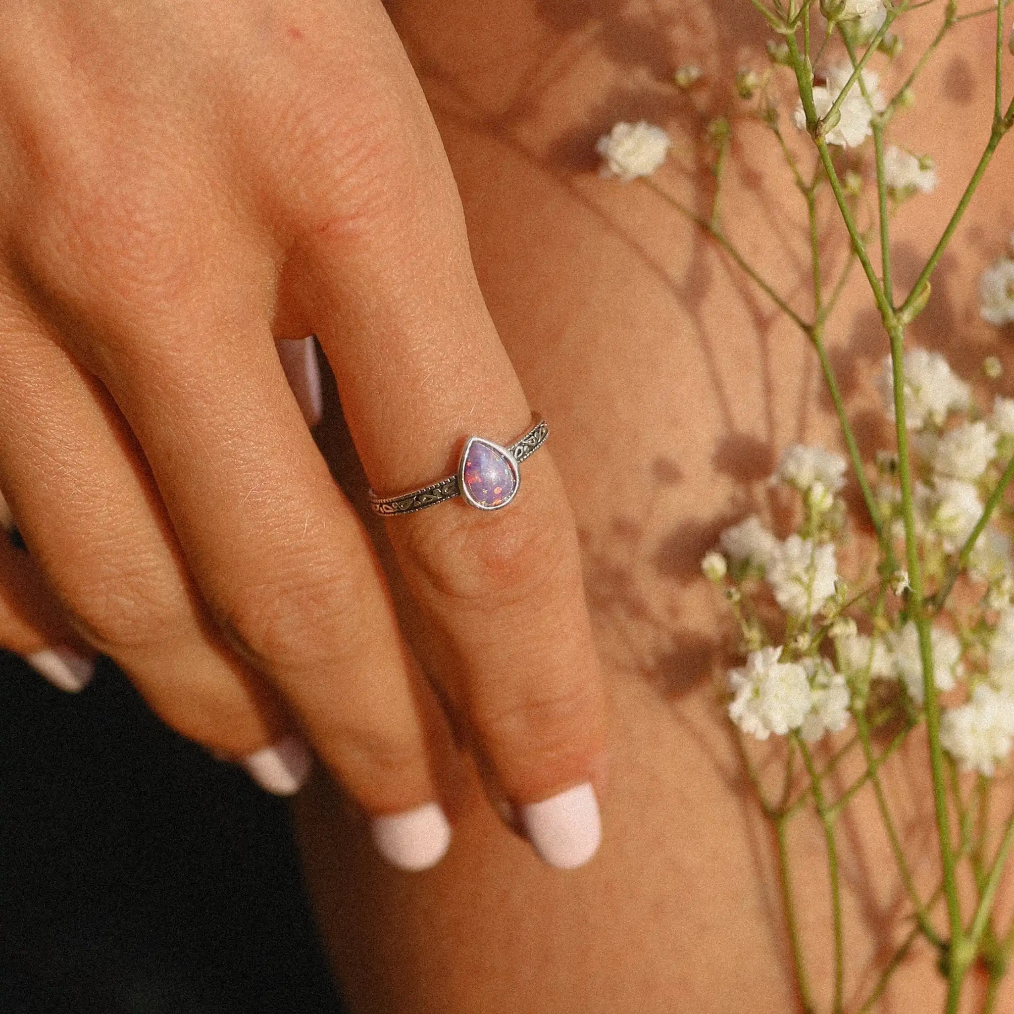 indie and harper sterling silver Purple Opal Ring being worn
