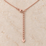 9k rose gold curb chain clasp and 2 inch extender with i+h heart tag